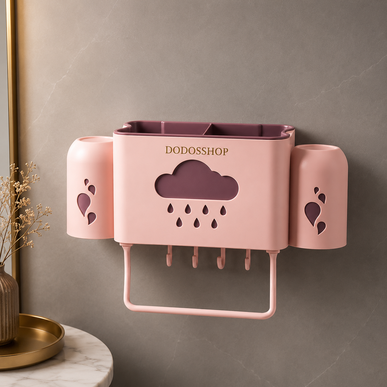 Bathroom Storage Rack
Pink wall-mounted toothbrush holder and cup holder set with a paper towel holder, featuring heart and cloud cutout details, mounted on a gray wall.