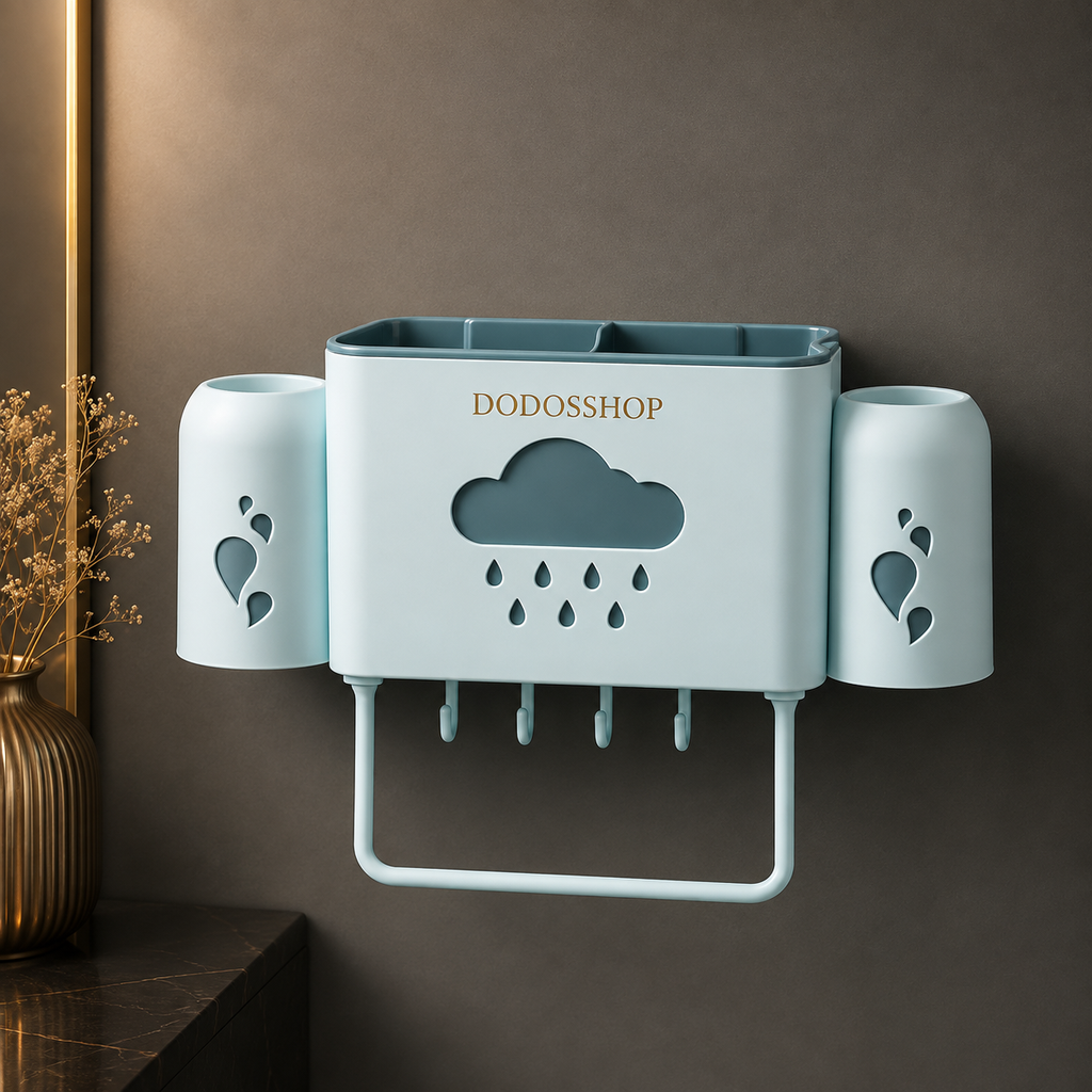 Bathroom Storage Rack
A wall-mounted toothbrush holder and tissue dispenser in a pale blue-green color, featuring two cup holders on the sides, a central cloud-shaped cutout with raindrop details, hanging toothpick slots, and a tissue roll holder. The brand name 'DODOSSHOP' is printed in gold on the front.