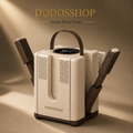 A DODOSSHOP smart shoe dryer in cream and dark brown, shown with two shoes inside the drying slots. The product is set against a warm beige background with dramatic diagonal lighting, and the brand name 'DODOSSHOP' is displayed at the top.