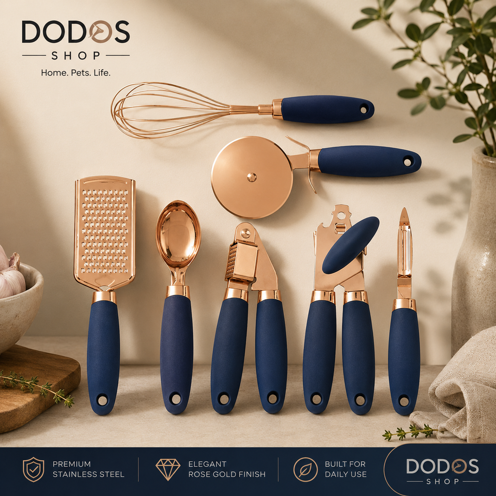 Elegant Stainless Steel Kitchen Tool Set

A 7-piece kitchen utensil set with navy blue handles and rose gold metallic heads, displayed on a beige surface with kitchen props. The set includes a whisk, pizza cutter, cheese grater, ice cream scoop, garlic press, wine opener, and peeler.