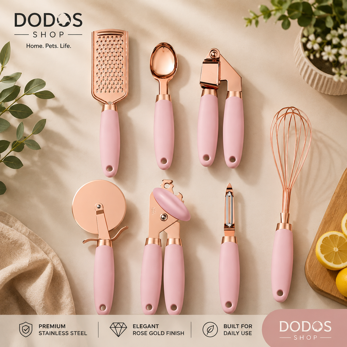 Elegant Stainless Steel Kitchen Tool Set

A set of eight kitchen utensils with pink handles and rose gold metal heads, arranged on a beige surface with decorative leaves, a plant, and lemon slices. The brand logo 'DODOS SHOP' is visible at the top and bottom of the image.
