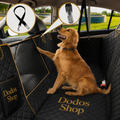 Pet Car Seat Cover
A golden retriever sits in the back of a car wearing a black quilted pet car seat cover with gold trim and mesh panels. Two circular inset callouts at the top show included accessories: a black strap and a USB charging port cover.