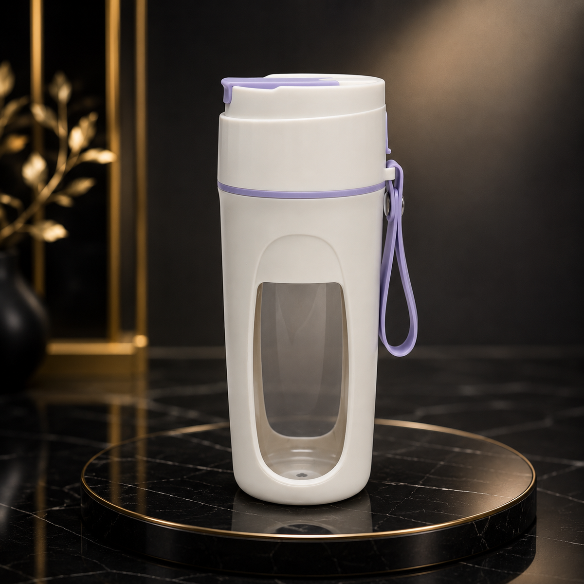 A white travel tumbler with a clear window and lavender purple accents, including a matching wrist strap, displayed on a round black marble coaster.