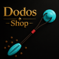 Suction Cup Pets Toys
A pet tug toy with a turquoise blue football-shaped head, dark brown elastic cords, and a small red loop, shown on a black background with the text 'Dodos Shop' and scattered brown kibble balls.