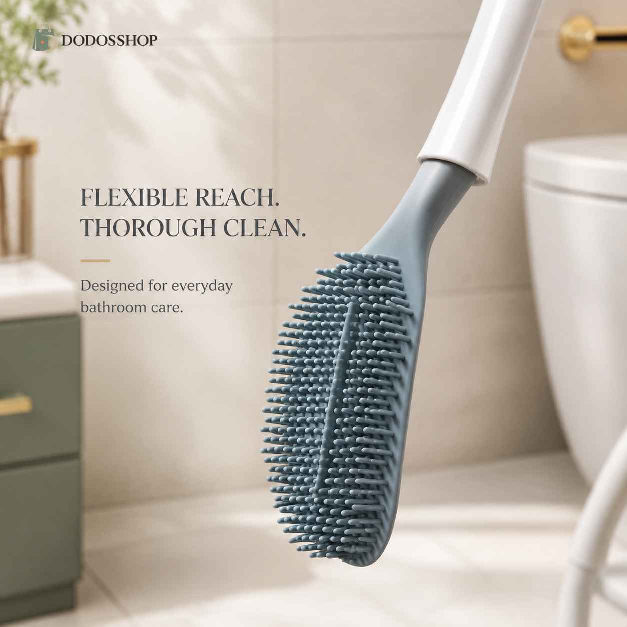 A flexible bathroom cleaning brush with a slate blue silicone bristle head and a white handle, shown in a clean, modern bathroom setting with text overlays from DODOSShop.